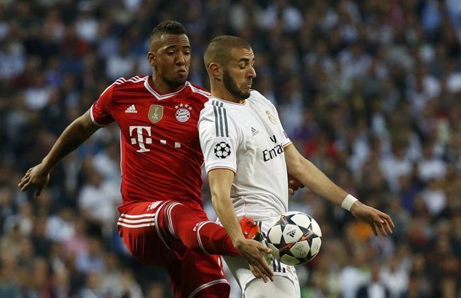 Benzema e Jerome Boateng. Al 35&#39; del primo tempo, 75% di possesso  palla  del Bayern. Reuters